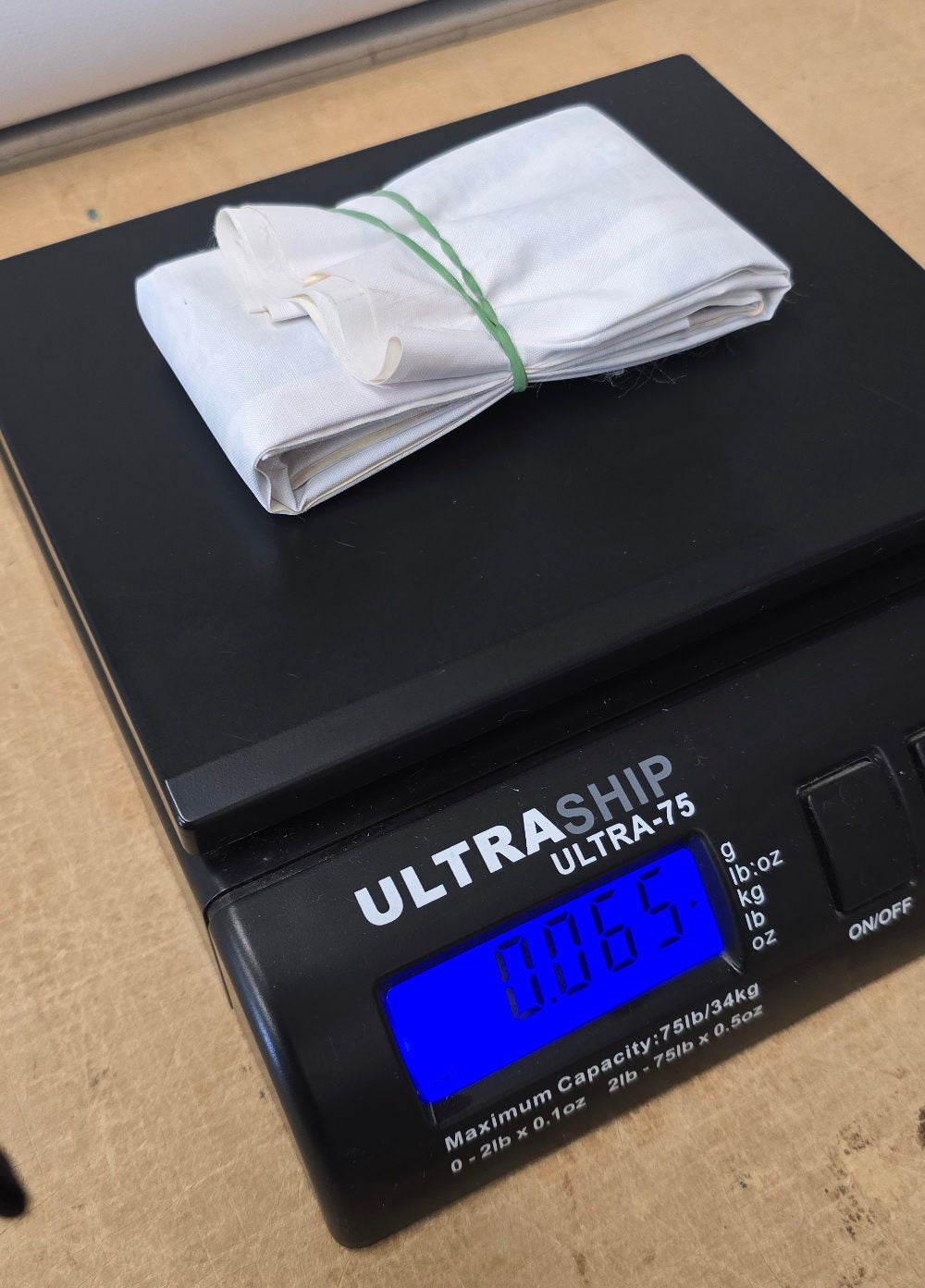 Fabric poster on scales, A1 poster 65g